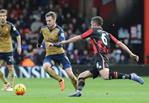 Bournemouth V Arsenal 2015-16 Prints: Ramsey's Powerful Surge: Arsenal's Midfield Maestro Outmaneuvers Surman in Bournemouth Clash