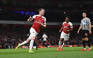 Arsenal V Newcastle United 2018-19 Prints: Ramsey's Thrilling Goal: Arsenal's Triumph Over Newcastle United