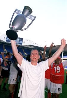 Ray Parlour (Arsenal) celebrates winning the League with an inflatable trophy