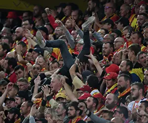 RC Lens V Arsenal 2023-24 Prints: RC Lens vs. Arsenal: Thrilling Champions League Clash with Fan Surfing Euphoria