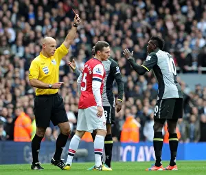 Red Card Drama: Adebayor Dismissed as Arsenal Face Tottenham in Premier League Clash
