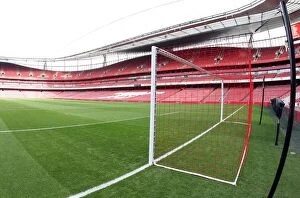 Images Dated 31st January 2010: Red Nets Raise Awareness: Arsenal's Lace Up Save Lives Campaign Amidst Manchester United's Victory