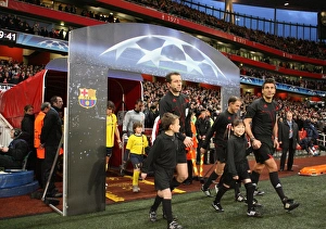 The Referees walk out with the mascots. Arsenal 2: 2 Barcelona. UEFA Champions League