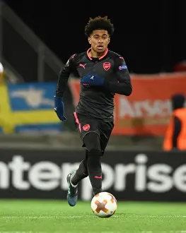 Ostersunds V Arsenal 2017-18 Prints: Reiss Nelson: Arsenal's Rising Star Dazzles in Europa League Showdown against Ostersunds FK