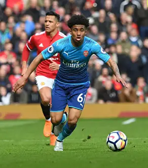 Manchester United V Arsenal 2017-18 Prints: Reiss Nelson Faces Off Against Manchester United: Arsenal vs