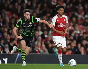 Arsenal V Doncaster Rovers - Carabao Cup 2017-18 Prints: Reiss Nelson Outmaneuvers Ben Whiteman: Arsenal vs Doncaster Rovers, Carabao Cup 2017-18