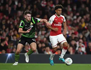 Arsenal V Doncaster Rovers - Carabao Cup 2017-18 Prints: Reiss Nelson Outmaneuvers Ben Whiteman in Arsenal's Carabao Cup Victory