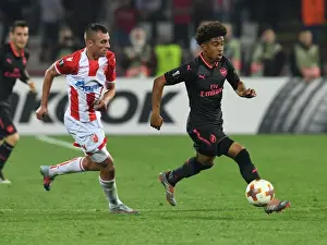 Red Star Belgrade V Arsenal 2017-18 Prints: Reiss Nelson Outmaneuvers Nenad Krsticic: Crvena Zvezda vs