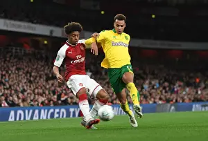 Arsenal V Norwich - Carabo Cup 4th Round 2017-18 Prints: Reiss Nelson vs. Josh Murphy: A Carabao Cup Battle at Arsenal's Emirates Stadium