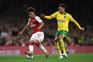 Arsenal V Norwich - Carabo Cup 4th Round 2017-18 Prints: Reiss Nelson vs. Josh Murphy: A Carabao Cup Showdown at Arsenal's Emirates Stadium