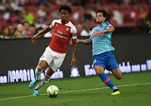 Arsenal V Atletico Madrid 2018-19 Prints: Reiss Nelson vs. Mikel Carro: Clash at the International Champions Cup 2018 between Arsenal and Atletico Madrid