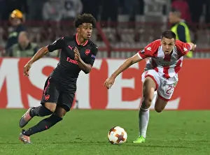 Red Star Belgrade V Arsenal 2017-18 Prints: Reiss Nelson vs Milan Rodic: Clash in the Europa League between Crvena Zvezda and Arsenal