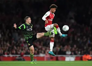 Arsenal V Doncaster Rovers - Carabao Cup 2017-18 Prints: Reiss Nelson vs. Tommy Rowe: Arsenal's Young Star Shines Against Doncaster in Carabao Cup