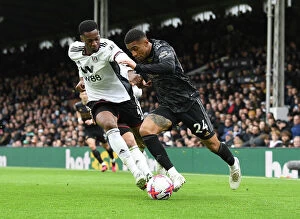 Images Dated 12th March 2023: Reiss Nelson vs Tosin Adarabioyo: Battle at Craven Cottage - Fulham vs Arsenal