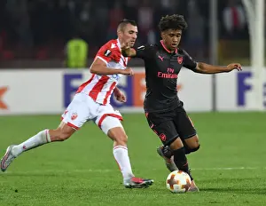 Red Star Belgrade V Arsenal 2017-18 Prints: Reiss Nelson's Slick Moves: Outmaneuvering Nenad Krsticic in Arsenal's Europa League Triumph