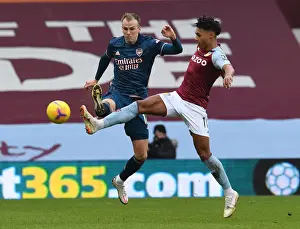 Rising Tensions: Holding vs. Watkins in Aston Villa vs. Arsenal Premier League Clash