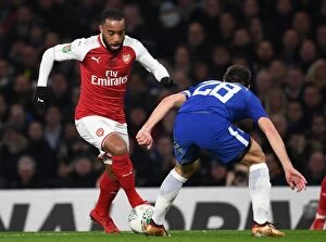 Chelsea v Arsenal - Carabao Cup 1/2 final 1st leg 2017-18 Collection: A Riveting Battle: Alexis Lacazette vs. Andreas Christensen in the Carabao Cup Semi-Finals