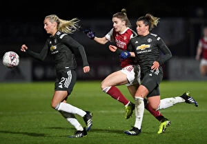 Images Dated 19th March 2021: Riveting Rivalry: Arsenal Women vs Manchester United Women at Empty Meadow Park Amidst Pandemic