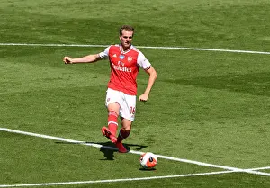 Rob Holding in Action: Arsenal's Defensive Battle against Brighton & Hove Albion, Premier League 2019-2020
