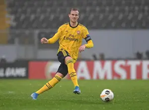 Rob Holding in Action: Arsenal's Europa League Clash against Vitoria Guimaraes