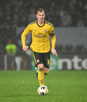 Rob Holding in Action: Arsenal's Europa League Clash vs. Vitoria Guimaraes