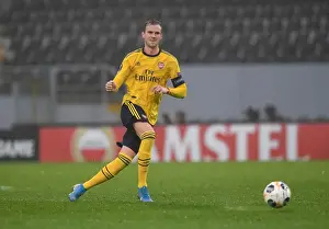 Rob Holding in Action: Arsenal's Europa League Clash vs Vitoria Guimaraes