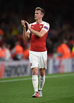 Rob Holding Celebrates with Fans after Arsenal's Europa League Victory over Vorskla Poltava