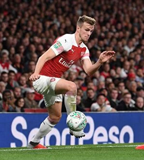 Images Dated 26th September 2018: Rob Holding Focuses in Arsenal's Carabao Cup Clash Against Brentford