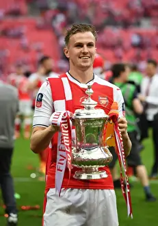 Rob Holding Lifts the FA Cup: Arsenal's Triumph over Chelsea