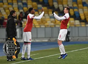 FC Vorskla Poltava V Arsenal 2018-19 Prints: Rob Holding and Zech Medley: A Moment of Camaraderie in Arsenal's UEFA Europa League Match against Vorskla Poltava