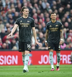Liverpool v Arsenal 2022-23 Collection: Rob Holding's Defiant Performance: Arsenal's Gritty Stand against Liverpool in Premier League