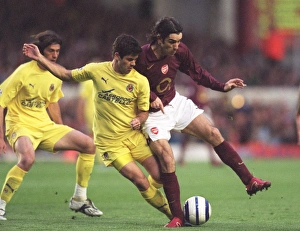 Arsenal v Villarreal 2005-6 Gallery: Robert Pires (Arsenal) Cesar Arzo (Villarreal). Arsenal 1: 0 Villarreal