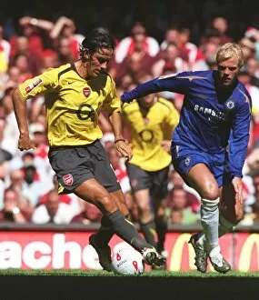 Chelsea v Arsenal 2005-06 Collection: Robert Pires (Arsenal) Eidur Gudjohnsen (Chelsea). Arsenal 1: 2 Chelsea