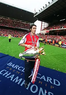 Robert Pires (Arsenal) with the F. A. Barclaycard Premiership Trophy