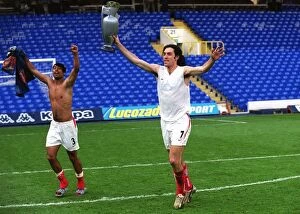 Robert Pires and Ashley Cole (Arsenal) celebrates winning the league