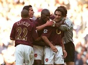 Campbell Sol Collection: Robert Pires celebrates scoring the Arsenal goal with Sol Campbell, Gael Clichy