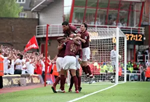 Robert Pires celebrates scoring Arsenals 1st goal with Jose Reyes and Cesc Fabregas