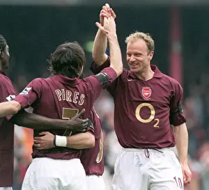 Robert Pires celebrates scoring Arsenals 2nd goal with Dennis Bergkamp