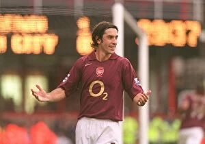Images Dated 22nd October 2005: Robert Pires celebrates scoring Arsenals goal from the penalty spot