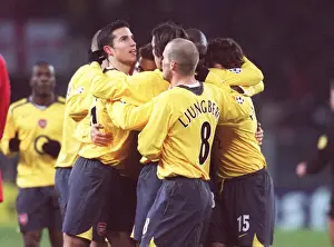 FC Thun V Arsenal Prints: Robert Pires celebrates scoring Arsenals goal from the penalty spot with Robin van Persie