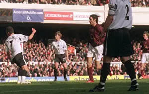 Robert Pires scores Arsenals 1st goal past Radostin Kishishev (Charlton)