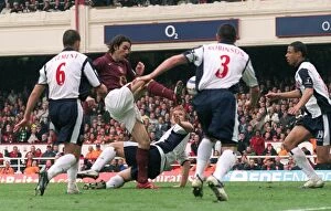 Images Dated 17th April 2006: Robert Pires scores Arsenals 2nd goal. Arsenal v West Bromwich Albion