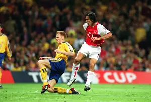 Robert Pires shoots past Southampton defender Michael Svensson to score the Arsenal goal