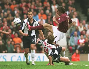 Robert Pires shoots past West Brom goalkeeper Tomasz Kuszczak to score the 2nd Arsenal goal