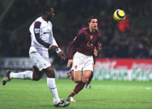 Bolton v Arsenal 2005-6 Collection: Robin van Perise (Arsenal) Bruno N Gotty (Bolton). Bolton Wanderers 2: 0 Arsenal