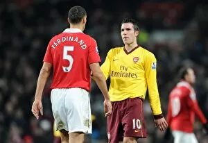 Images Dated 13th December 2010: Robin van Perise (Arsenal) Rio Ferdinand (Man Utd). Manchester United 1: 0 Arsenal