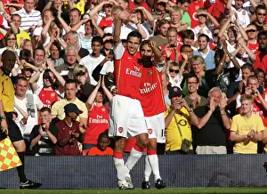 Robin van Perise celebrates scoring Arsenals 2nd goal with Mathieu Flamini