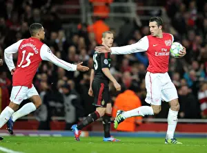 Robin van Persie and Alex Oxlade-Chamberlain: Arsenal's Unstoppable Duo Celebrates 3:0 Over AC Milan in UEFA Champions League
