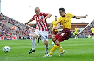 Images Dated 8th May 2011: Robin van Persie (Arsenal) Andy Wilkinson (Stoke). Stoke City 3: 1 Arsenal