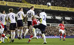 Tottenham Hotspur V Arsenal 2009-10 Prints: Robin van Persie (Arsenal) bends a free kick round the Tottenham wall. Tottenham Hotspur 2